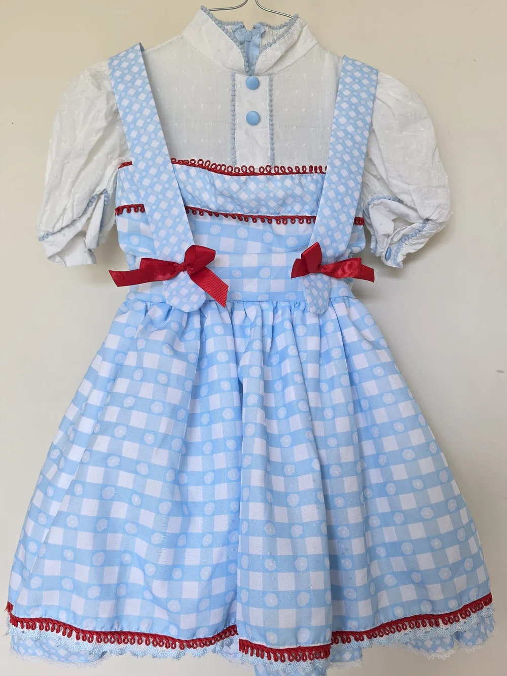 Children's Light Blue Gingham Costume Dress with Red Bow Accents